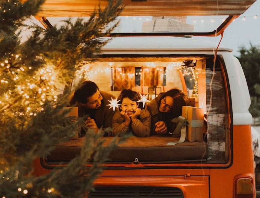 Cozy family celebration in camper van